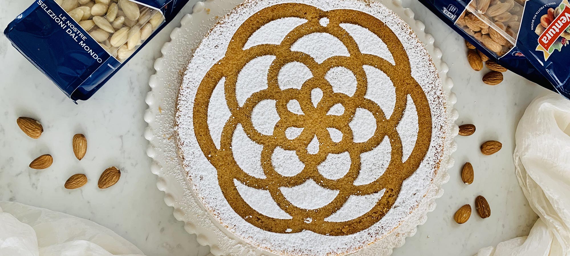 torta panarello decorazione zucchero a velo mandorle ventura