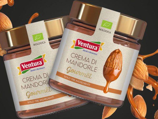 creme spalmabili gourmet ventura in barattolo con mandorle in guscio e sfondo nero